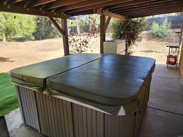 view of patio featuring a hot tub