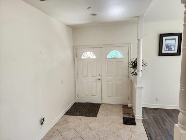 entryway with light hardwood / wood-style flooring