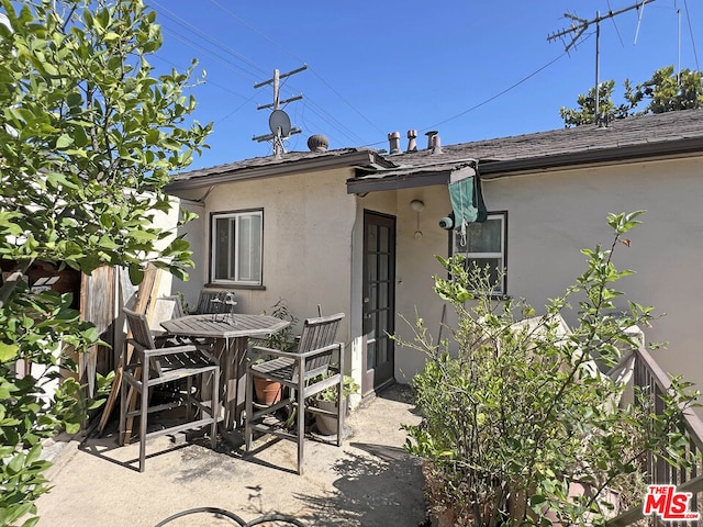 back of house with a patio area