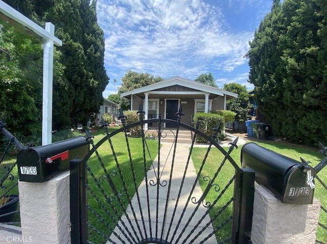 view of front facade with a porch and a front yard