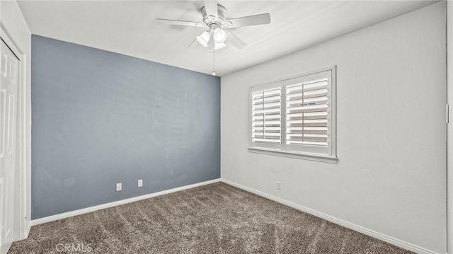 empty room with carpet and ceiling fan