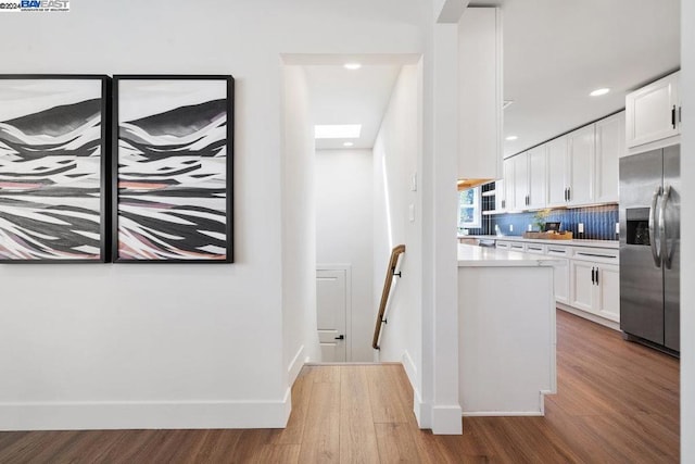 hall featuring light hardwood / wood-style flooring