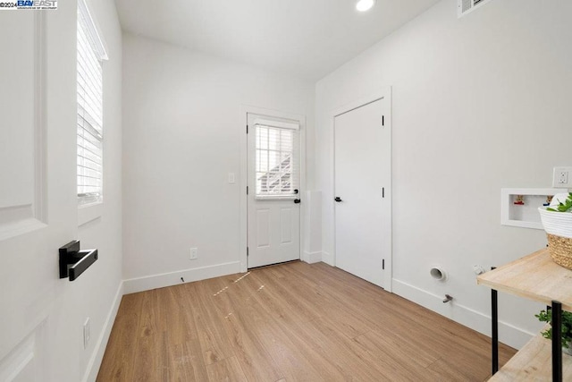 entrance foyer featuring light wood-type flooring