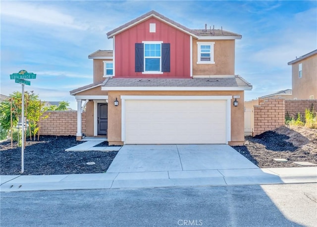 front of property with a garage