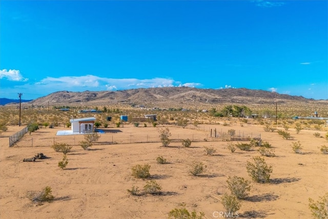 view of mountain feature featuring a rural view