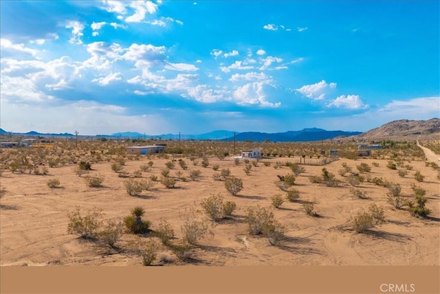 property view of mountains with a rural view and view of desert