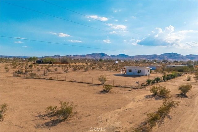 property view of mountains with view of desert and a rural view