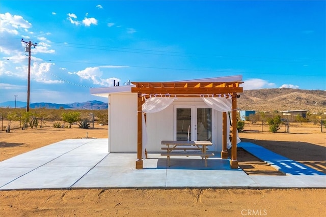 exterior space featuring a mountain view