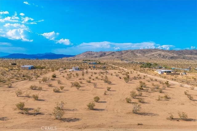 property view of mountains with a rural view and view of desert