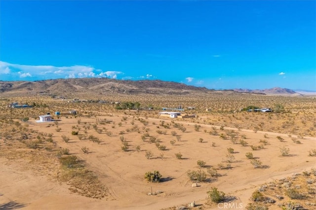 view of mountain feature with view of desert and a rural view