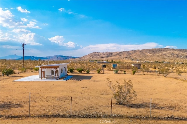 property view of mountains with a rural view