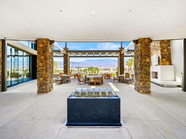 view of patio / terrace featuring outdoor lounge area and a mountain view