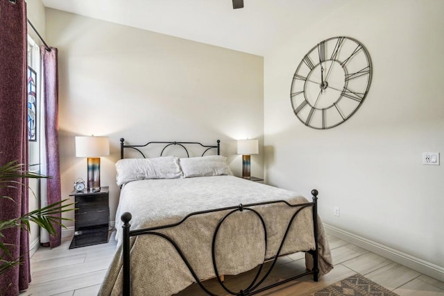 bedroom featuring ceiling fan and light hardwood / wood-style flooring