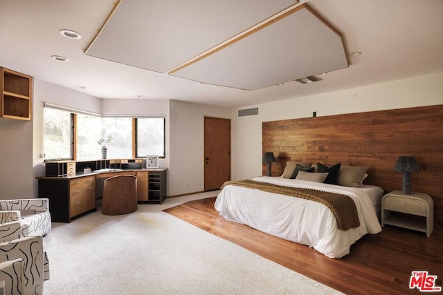 bedroom featuring hardwood / wood-style floors