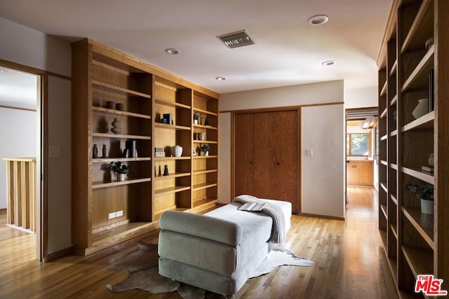 living area featuring hardwood / wood-style floors