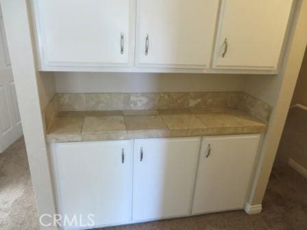 kitchen with white cabinetry