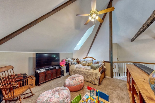 interior space featuring ceiling fan and lofted ceiling with skylight