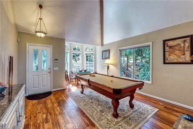 playroom featuring vaulted ceiling, dark hardwood / wood-style flooring, and pool table