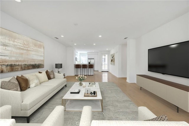 living room featuring light wood-type flooring