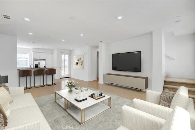 living room featuring light hardwood / wood-style floors