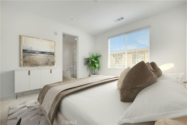 bedroom featuring light carpet and radiator