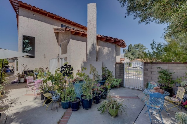 back of house featuring a patio area