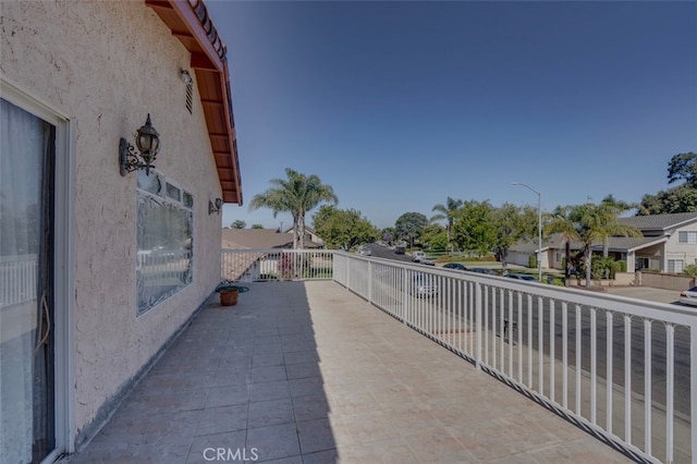 view of patio with a balcony