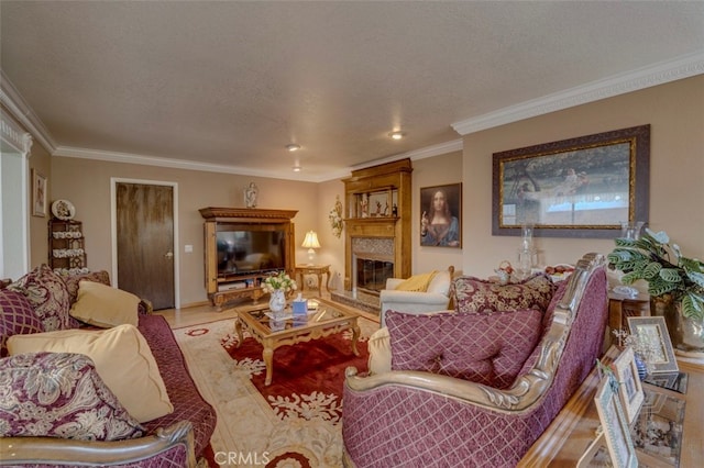 living room with a textured ceiling and ornamental molding