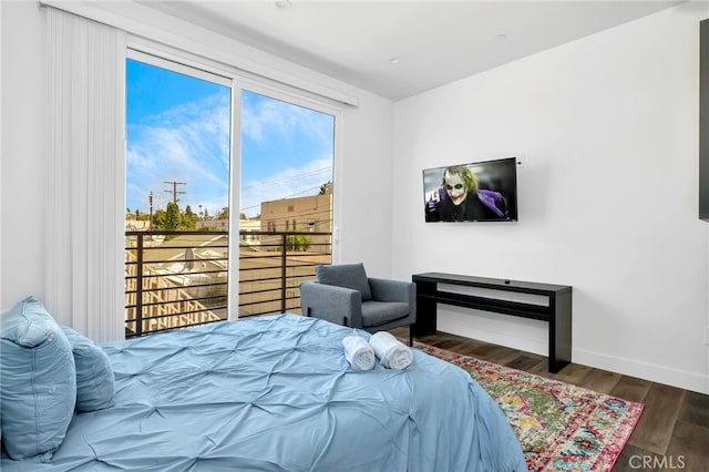 bedroom featuring dark wood-type flooring