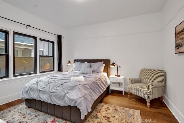 bedroom featuring hardwood / wood-style floors