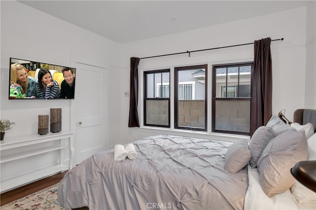 bedroom featuring hardwood / wood-style floors