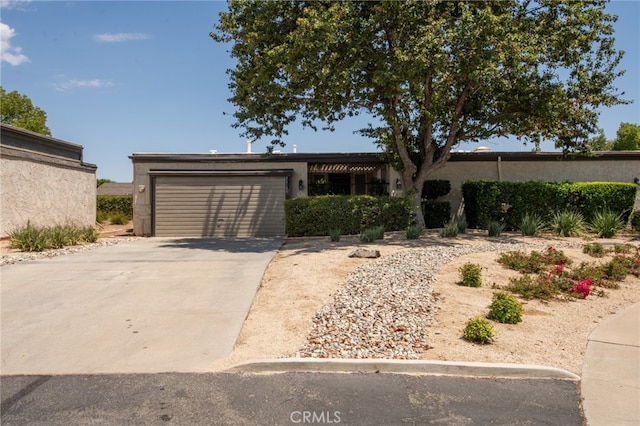 single story home featuring a garage