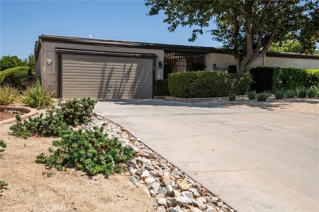 ranch-style house with a garage