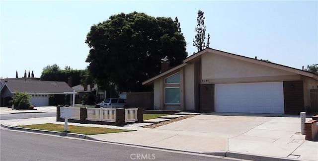 ranch-style home with a garage