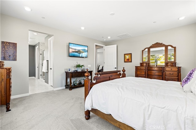 bedroom featuring light carpet