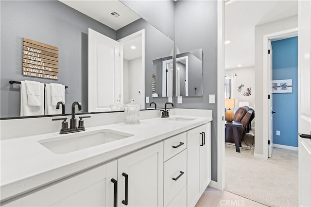 bathroom featuring vanity and tile patterned floors