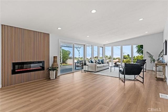 unfurnished living room with light hardwood / wood-style flooring