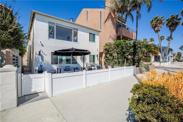 view of front of home featuring a patio area