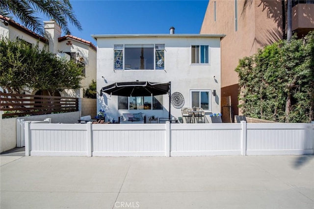 view of front of property with a patio area