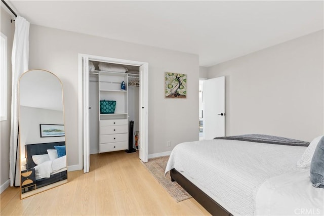 bedroom with light wood-type flooring