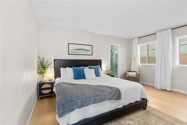 bedroom with light wood-type flooring