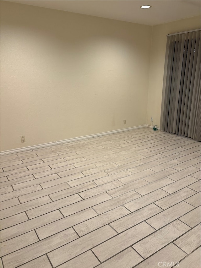 unfurnished room featuring light hardwood / wood-style flooring