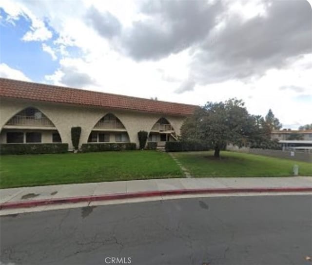 view of front of home with a front yard