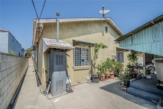 back of house featuring a patio area