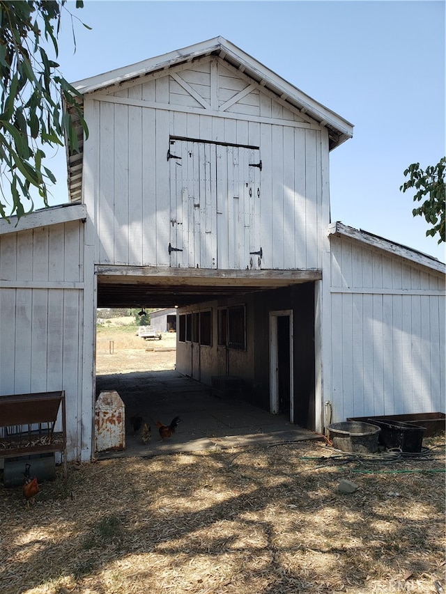 exterior space with an outbuilding