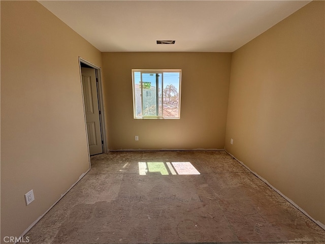 empty room featuring light colored carpet