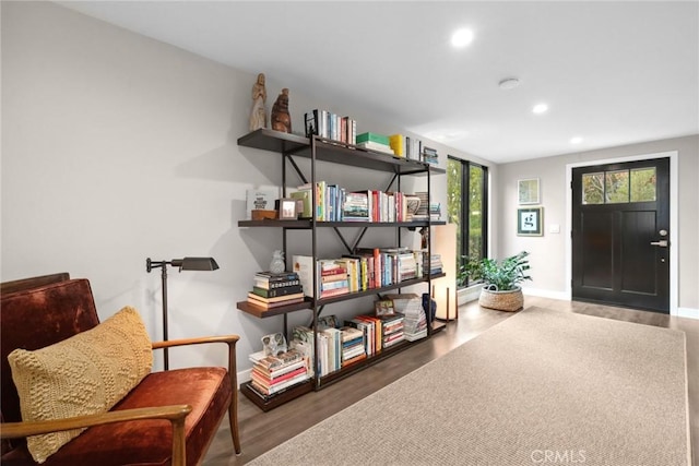 sitting room featuring hardwood / wood-style flooring