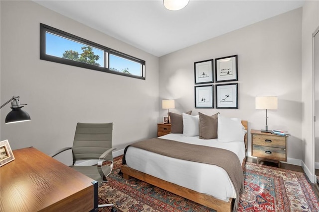 bedroom featuring hardwood / wood-style flooring