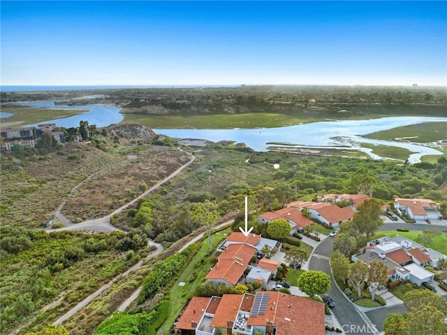 drone / aerial view with a water view