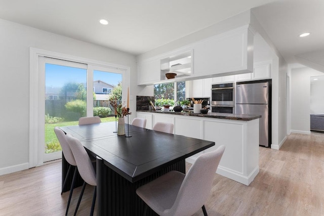 dining area featuring light hardwood / wood-style floors